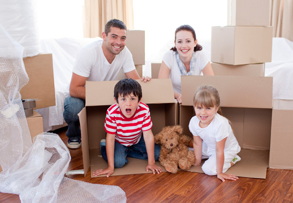 image of a happy family moving with kids