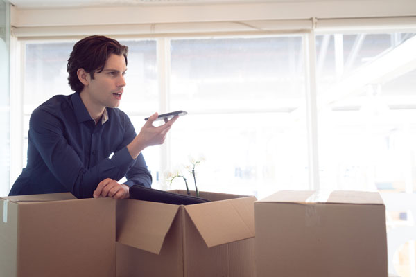 photo of a person calling a moving company