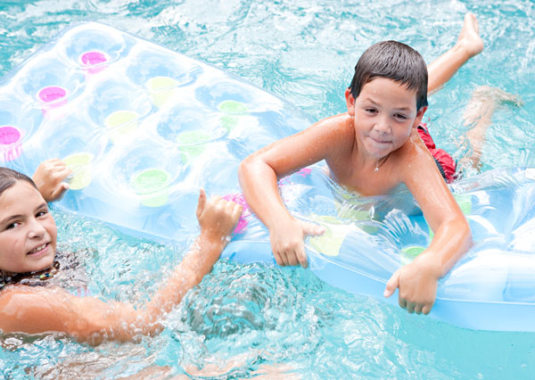 photo of kids enjoying in pool